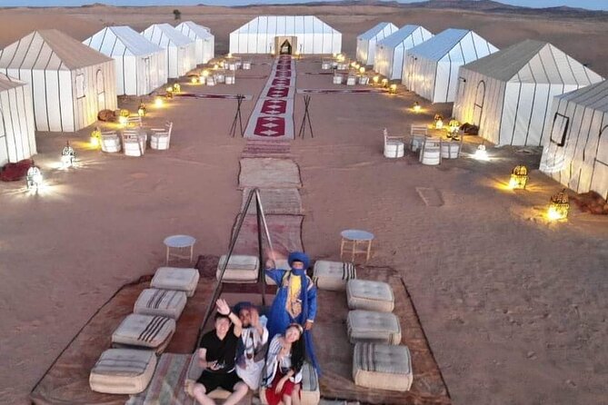 2 Days Private Luxury Excursion to Merzouga Desert from Fez - Reaching Merzouga: 4x4 Transfer, Luxury Camp Setup, and Camel Sunset