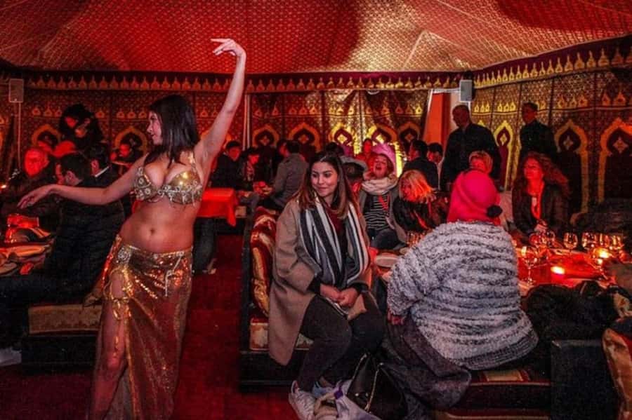 Agadir Fantazia Berber Night Show with Dinner - The performances while you eat: Gnaoua acrobats, fire acts, and dance