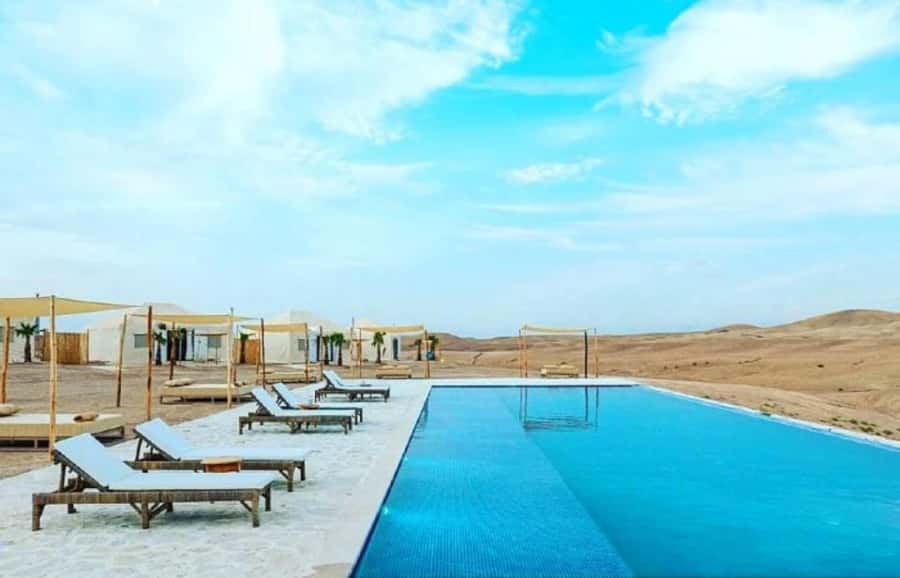 Agafay Desert Day: Quad Bike, Lunch & Swim Adventure - Swimming at the outdoor desert pool, with desert views