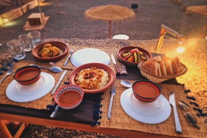 Agafay Desert, Dinner show with Quad bike and Camel Ride - Dinner in a Berber tent: firelight, food, and the music after