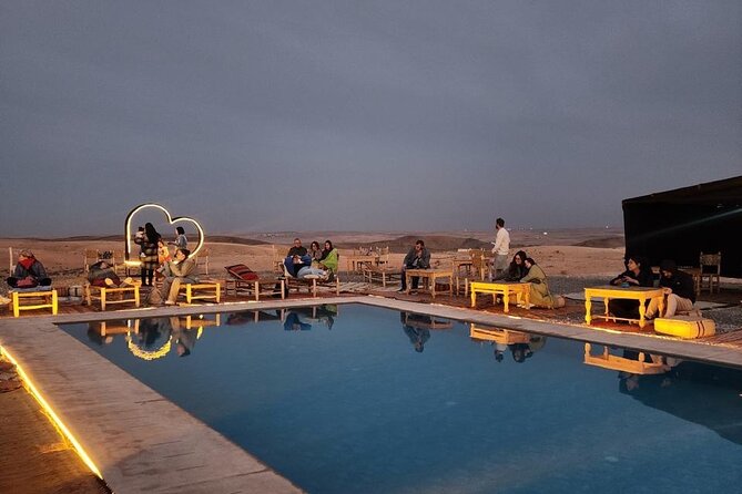 Agafay Desert package .Quad .30 minute Camel and Dinner show - The camp evening: tea, performances, and Moroccan atmosphere