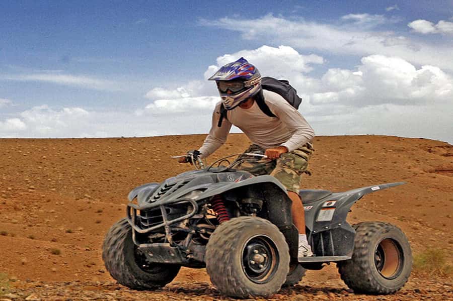 Agafay: Half-Day Rocky Desert Quad & Camel Ride with Lunch - Camel ride and nomad-style scarf photos