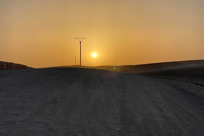 Agafay Sunset Trip: Quad + Camel + Dinner in Agafay - Dinner in the candlelit cabin, plus Gnawa and fire shows