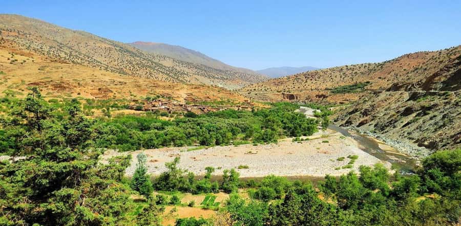 Atlas Mountains: Ijoukak and 4 Valleys with Camel Ride - Ijoukak village walk: pottery, daily routines, and how to show respect