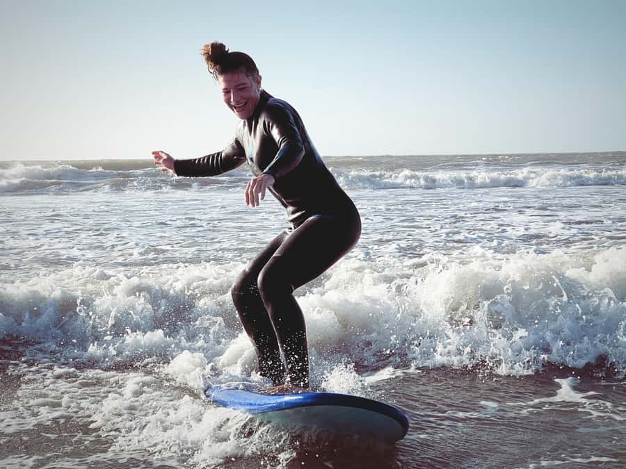 Beginners friendly surf in nice spots - The 2-Hour Flow: Pickup, Wetsuits, Sand Drills, Then Real Waves