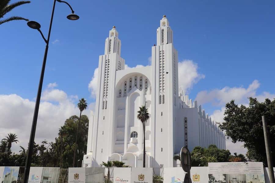Casablanca: Private Guided Tour - Arab League Park and the cathedral pair, churches with very different visual language