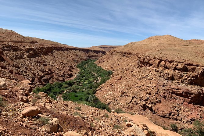 Day Trip from Marrakech to the ancient Kasbah Ait Ben Haddou & Telouet valley - Entering UNESCO Ait Ben Haddou: guided walking, family visit, and photo time