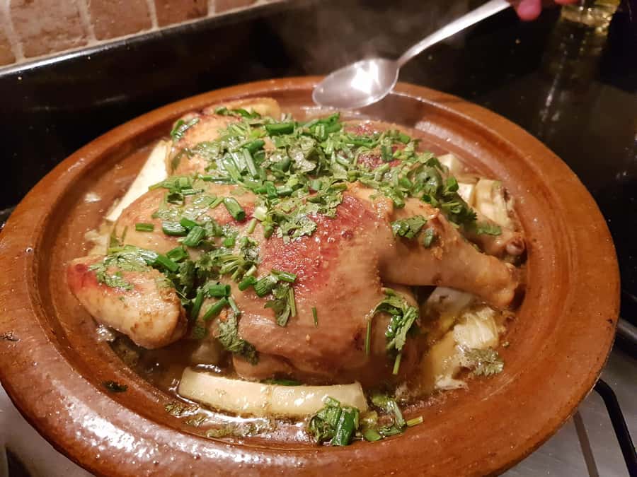 Edgy 8 Dish Private, Fusion Cooking Class, Menu Plan, Market - Market time in the souk: mint slaps, produce judging, and bargaining energy