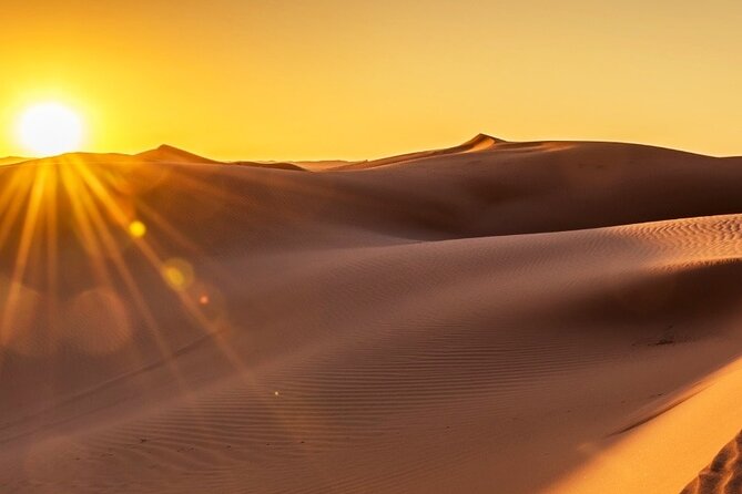 Exclusive Merzouga Desert Safari: Camel Ride, Sandsurf & Dinner - ATV and sand surfing through the orange dunes