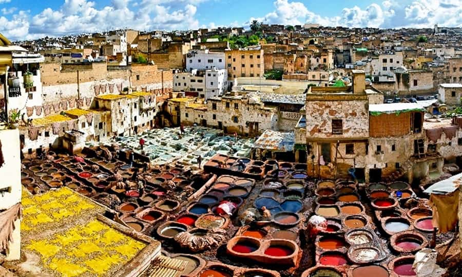 Explore Fes: Unforgettable Guided Walking Tour of the Medina - Souks and photo stops: how the guide controls the pace