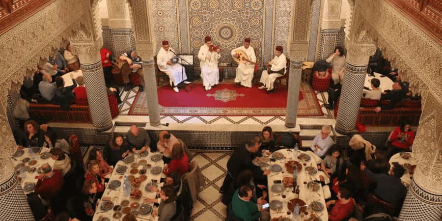 Fes : Unforgettable Dinner Show Experience with hotel pickup - What Happens at Dinner: Salads, Tajines, Couscous, and Mint Tea