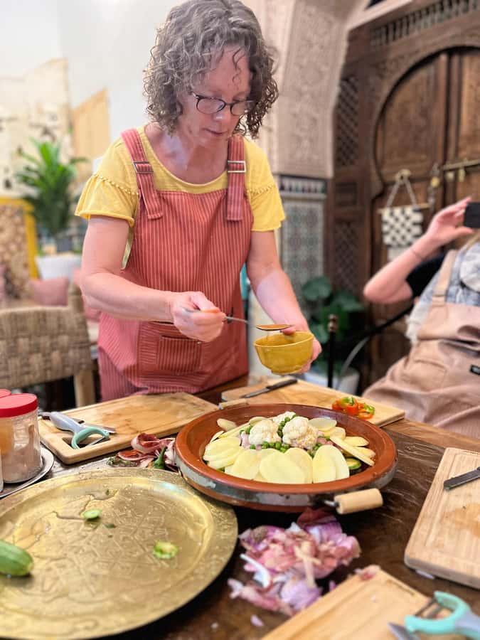 Fez: Souk Tour and Traditional Home Cooking Class - Hands-on cooking in a Fassi home kitchen