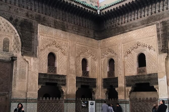 Fez Tour Medina Private Walking Tour With Local Guide - Entering the Medina Through Bab Boujloud and the Ceramic World