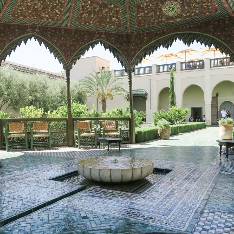 From Casablanca: Marrakech Guided Day Trip with Camel Ride - Bahia Palace and Mellah: royal gardens plus a different chapter of Marrakech