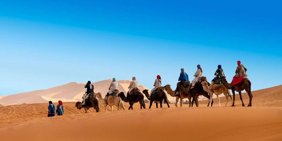 From Fes: 2-Day Merzouga Desert Trip(Luxury Tent & Dinner) - Merzouga Dunes at Sunset: Camels, Sandboarding, and the Moment You Wait For