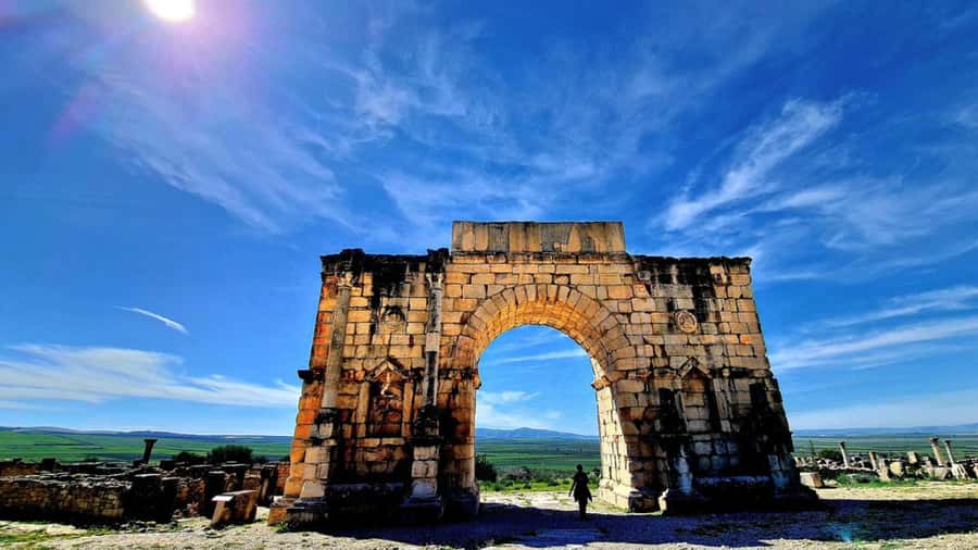 From Fes: Meknes Volubilis and Moulay Idriss Day Trip - Moulay Idriss Zerhoun: the holy town walk, mosque access, and viewpoint energy
