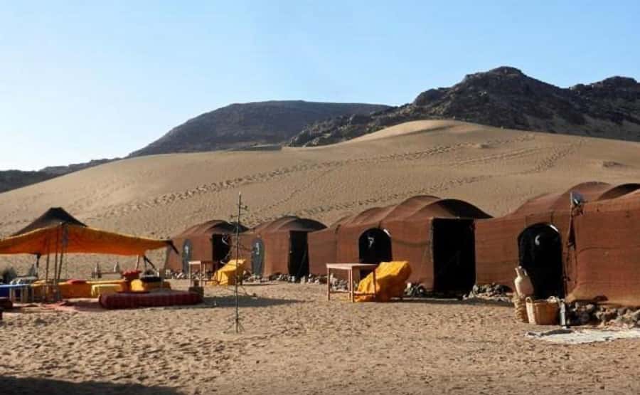 From Marrakech: 2-Days luxurious experience to Zagora Desert - Riding Into Zagora: Sunset Camel Time in Rocky Desert