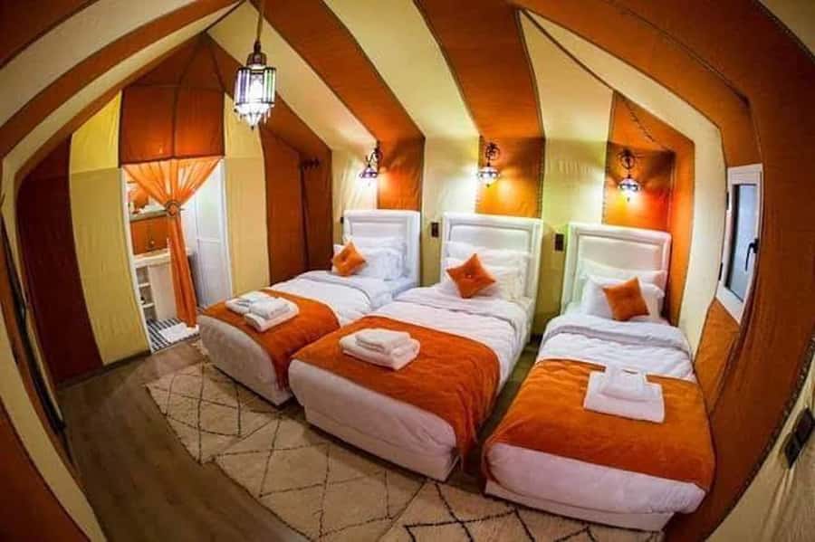 From Marrakech: 3-Day Luxury Desert Tour to Fes via Merzouga - Erg Chebbi camel trek, sand boarding, and your desert camp night