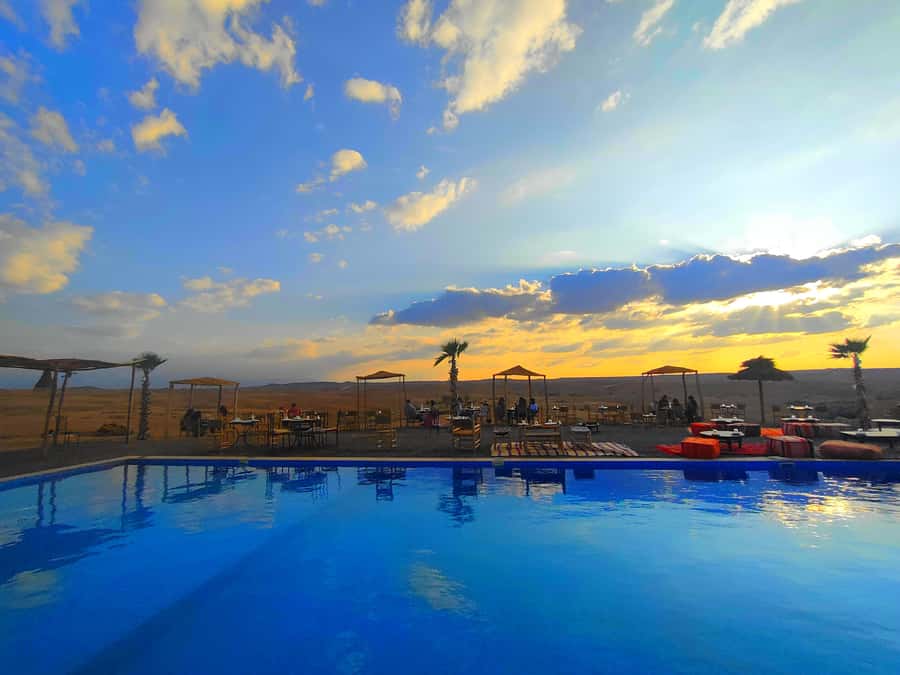 From Marrakech: Agafay Desert Sunset Dinner with Live Show - Sunset at Agafay: Where the Colors Do the Selling