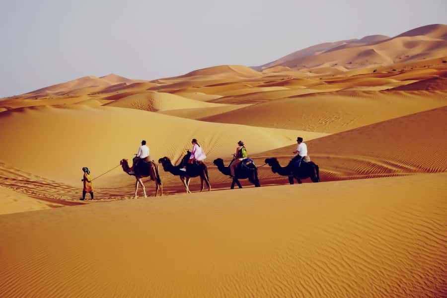 From Merzouga: Desert Overnight in Heated Tent & Camel Ride - Day 1 Camel Ride to Erg Chebbi: Sunset Views and Sandboarding