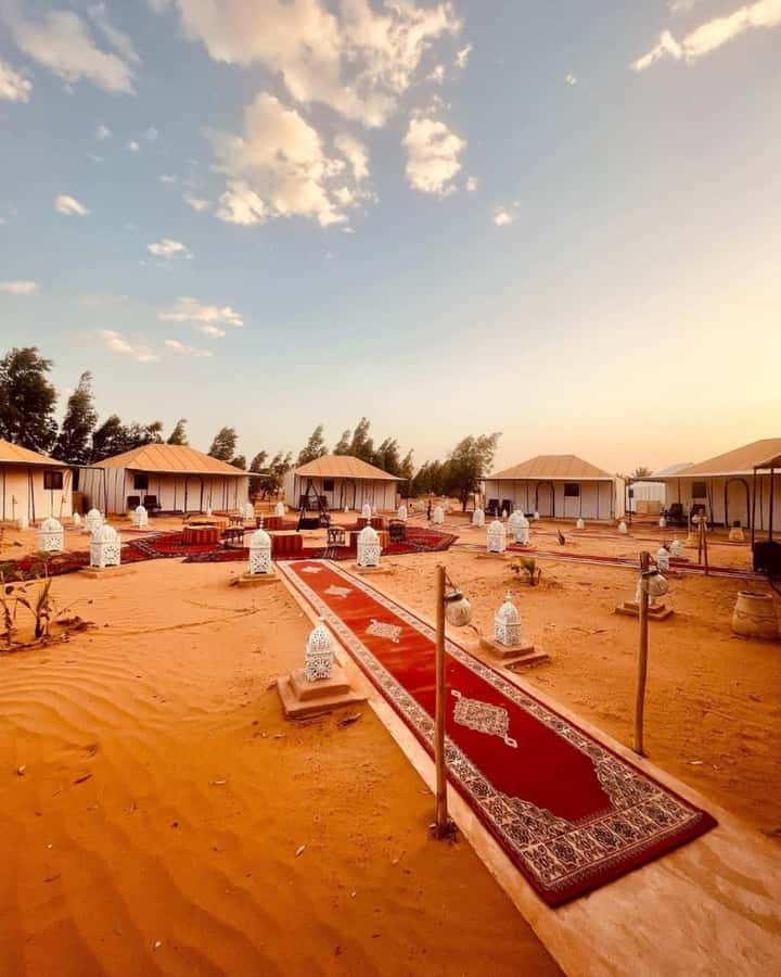 From Merzouga: Overnight Camel Trek over Erg Chebbi Dunes - Day 1: Sunset dunes, sandboarding, and a Berber welcome