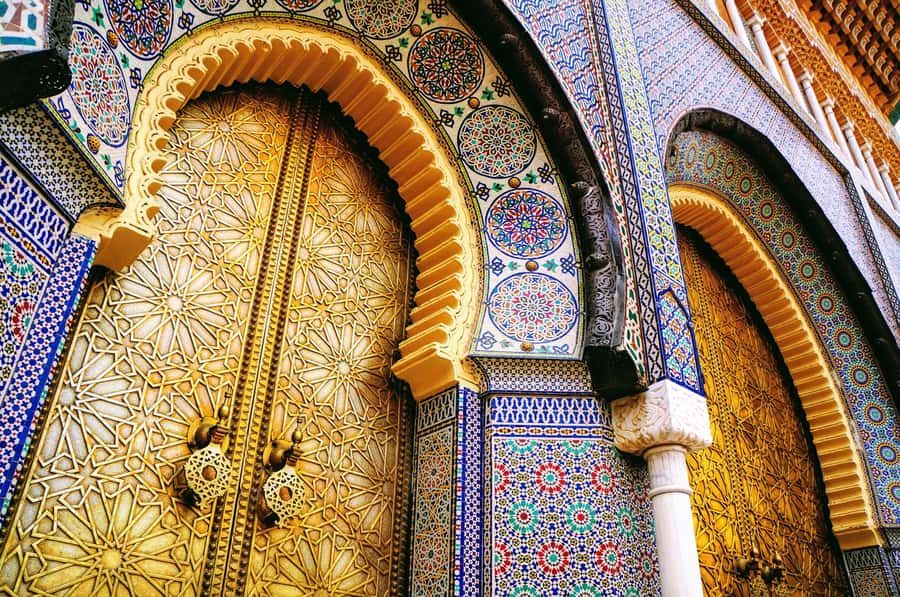 From Taghazout or Agadir: Marrakech Guided Day Trip - Entering the walled Medina with a guide who prevents lost-in-the-maze time