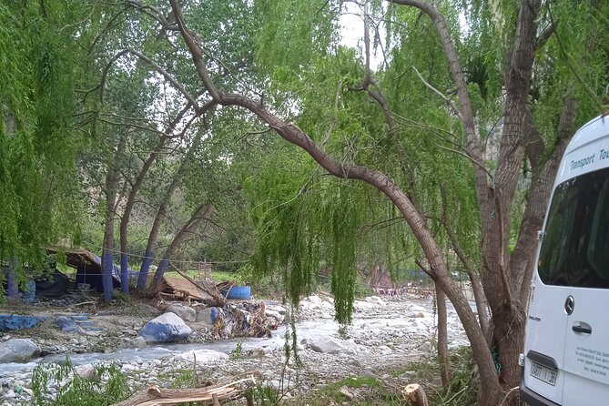 Full Day Trip to Ourika Valleys with waterfalls - The waterfall basin moment: a short boat stroll that changes the angle