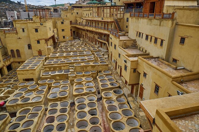 Half Day Guided Walking Tour in the Medina of Fez - Funduq al-Najjarin and Fontaine Nejjarine: woodworking in a stunning setting