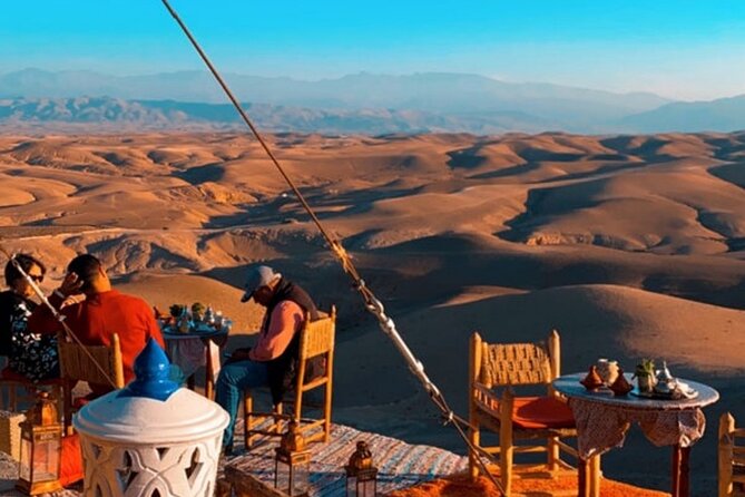 Marical dinner and camel ride at sunset in Desert of Marrakech - Camel ride in traditional Berber clothes, before the mountains even settle in
