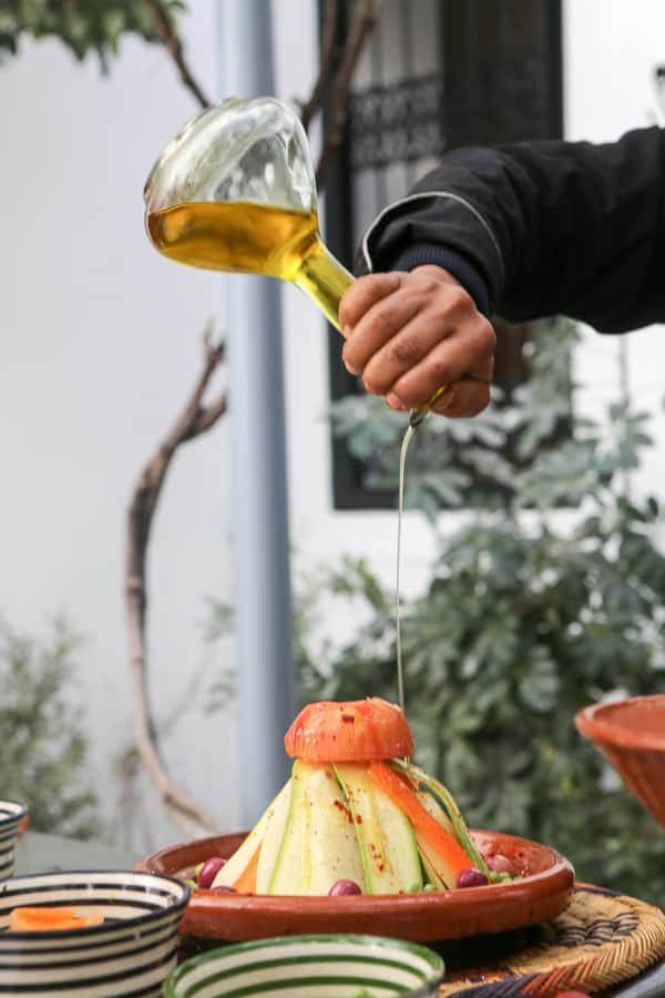 Marrakech: 3-Hour Open-Air Moroccan Cooking Course - The kitchen lesson style: chopping, marinating, and cooking with real guidance
