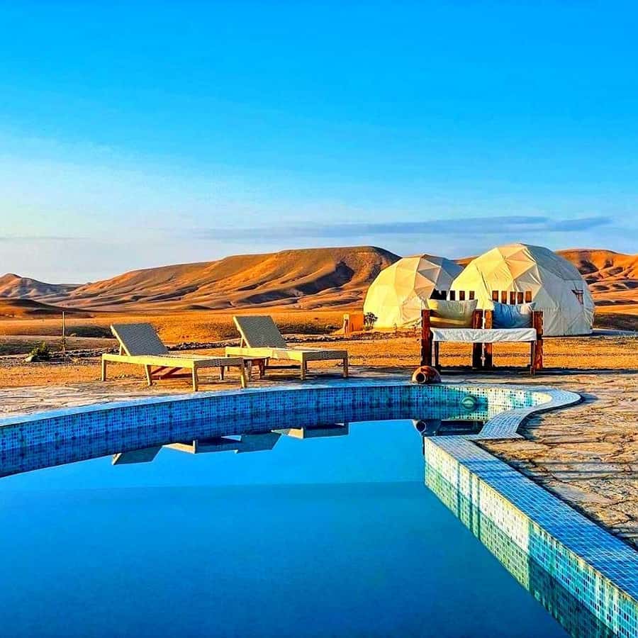 Marrakech: Agafay Desert Camp Lunch with Camel Ride and Pool - The Road Trip: Pickup, Time in the Van, and Bumpy Reality