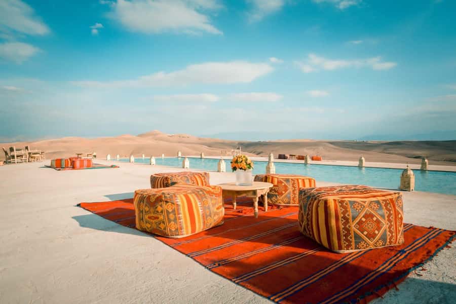 Marrakech: Agafay Desert Dinner and Sunset Camel Ride Trip - Air-conditioned hotel pickup: the easiest way to start the night right