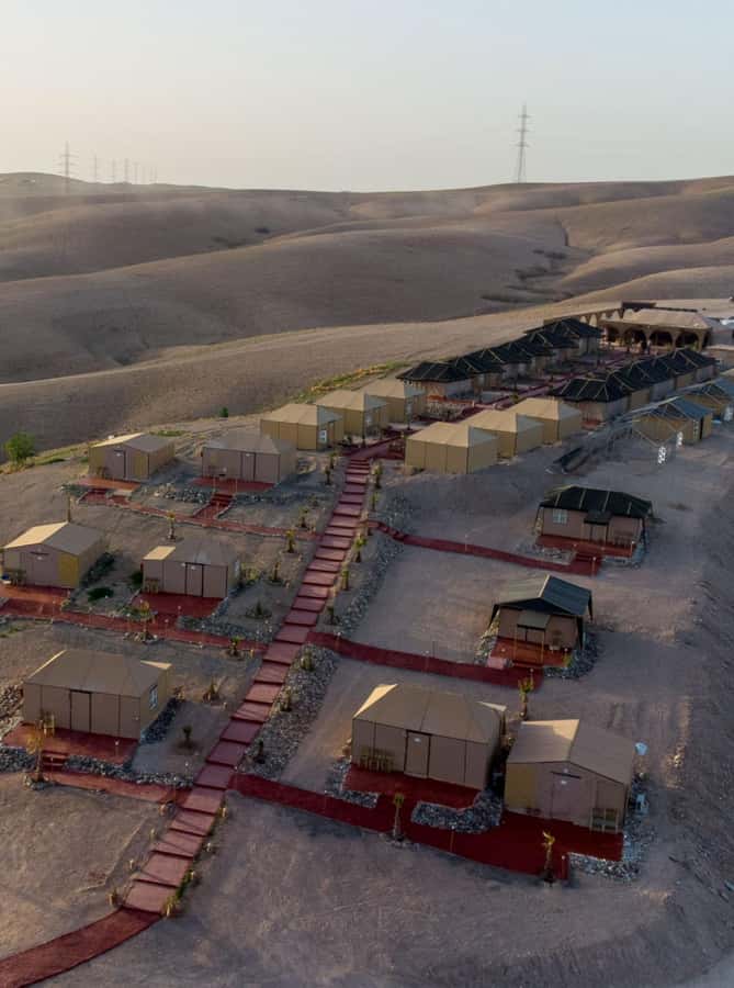 Marrakech: Agafay Desert Quad, Camel or Pool Day with Lunch - The show at camp: Gnawa music, belly dancers, and fire acts with audience energy