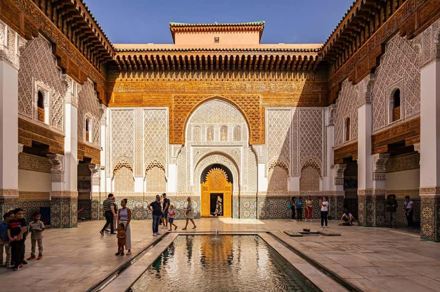 Marrakech: Ben Youssef, Secret Garden, & Souks Walking Tour - Ben Youssef Madrasa: stucco, courtyards, and why it mattered