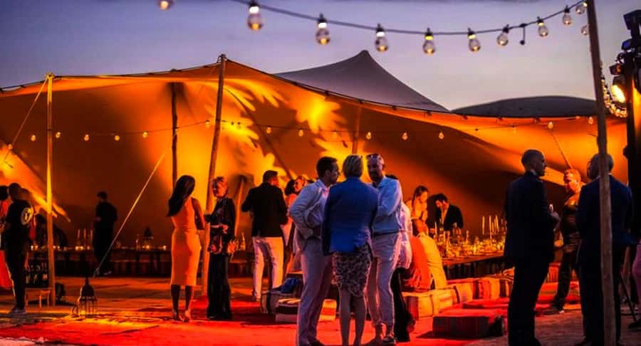 Marrakech: Camel Ride, Dinner, Pool, and Fire Show in Agafay - Desert camp tea, lanterns, and the moment night turns magical