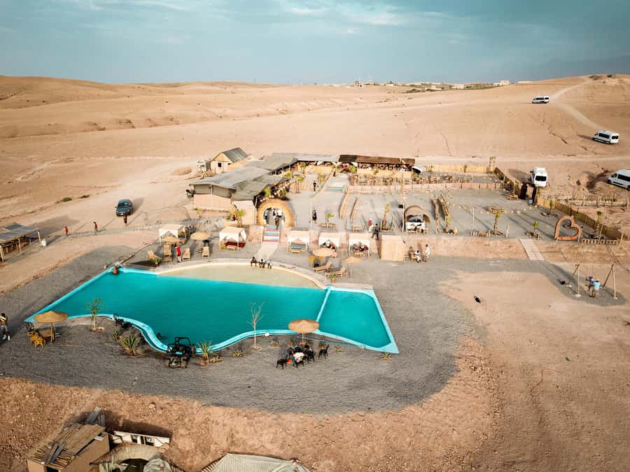 Marrakech: Camel Ride, Dinner, Pool, and Fire Show in Agafay - Pool time in the middle of the desert plan