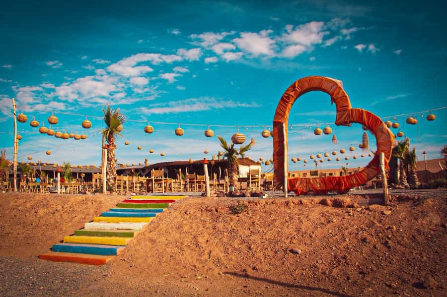 Marrakech: Camel Ride, Dinner, Pool, and Fire Show in Agafay - Dinner under the stars: couscous, tagine, and real Moroccan comfort