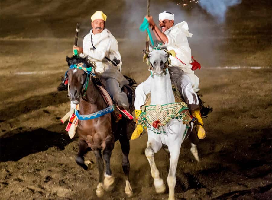 Marrakech: Chez Ali Fantasia Folklore Show & Moroccan Dinner - The show after dinner: music, dancers, acrobatics, and the fantasia horse riders