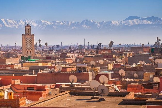 Marrakech City Highlights Half-Day Tour - The medina stroll: souks, bakeries, and real streets