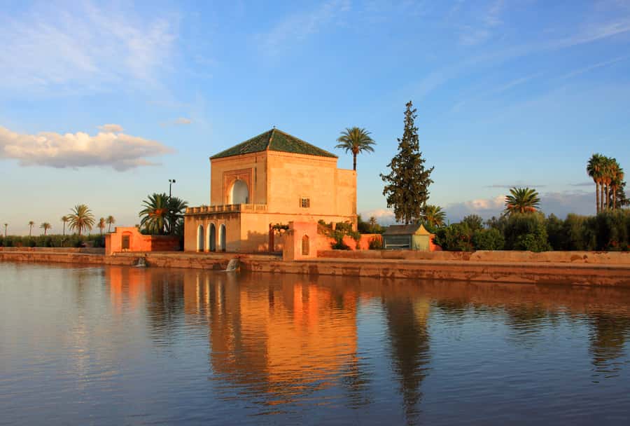 Marrakech: Glide Through the Red City on an EcoScooter Tour! - Menara Gardens: Saadian-era calm at the end of the ride