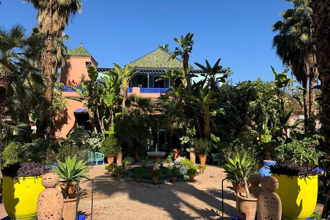 Marrakech Highlights: Private Guided Tour in 4 Hours - Koutoubia Mosque and Bab Agnaou, medieval landmarks with strong photo power