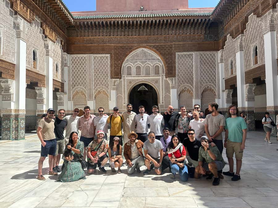 Marrakech: Madrasa Ben Youssef, Secret Garden & Medina Tour - Souks, hammams, and the spice square: what everyday rituals teach you