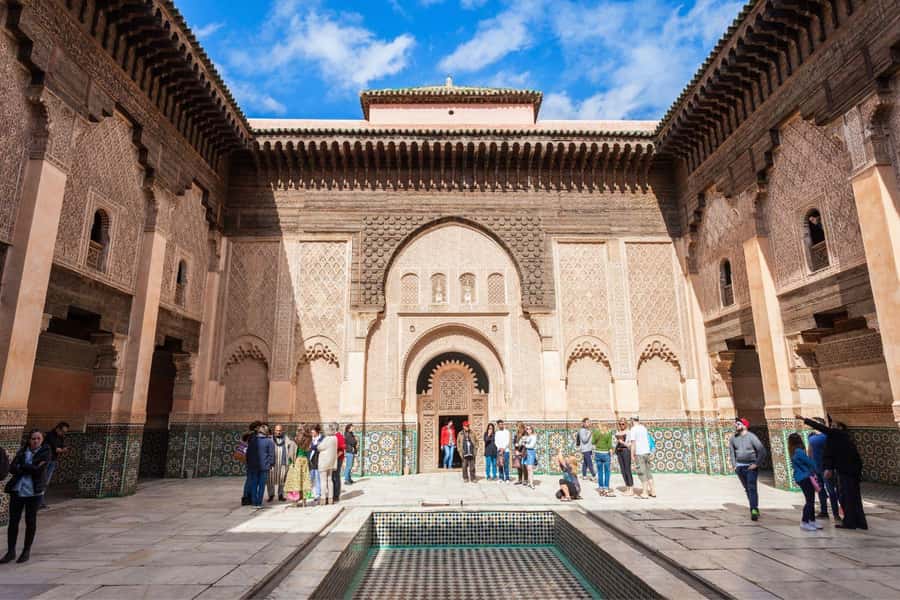Marrakech: Madrassa Ben Youssef, Secret Garden & Medina Tour - Starting at Café de France, Then Learning the Medina’s Main Story