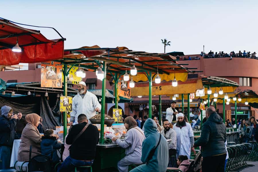 Marrakech: Medina by Night Walking Tour with Moroccan Tea - Tastings on the move: olives and dry fruit, plus tea or coffee