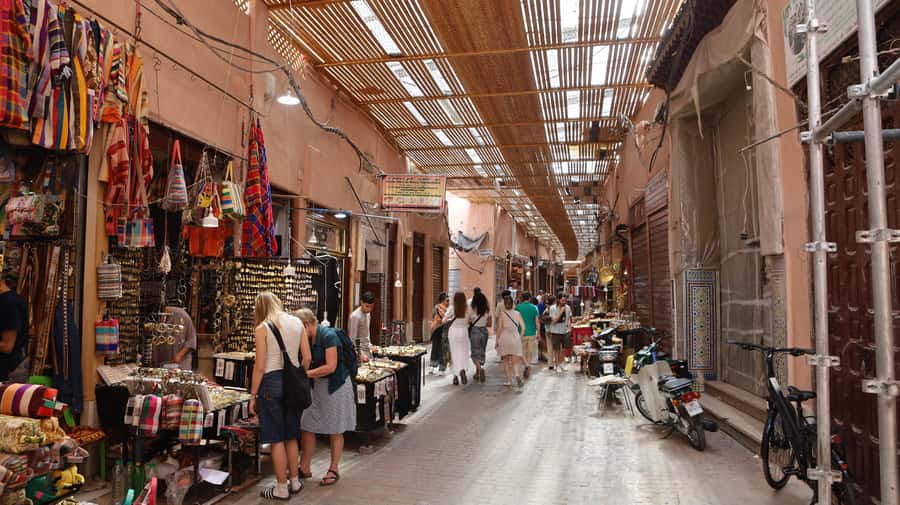 Marrakech: Medina, Souks, Artisans Guided Tour with Mint Tea - A mint tea break in the medina: rest, rhythm, and hospitality
