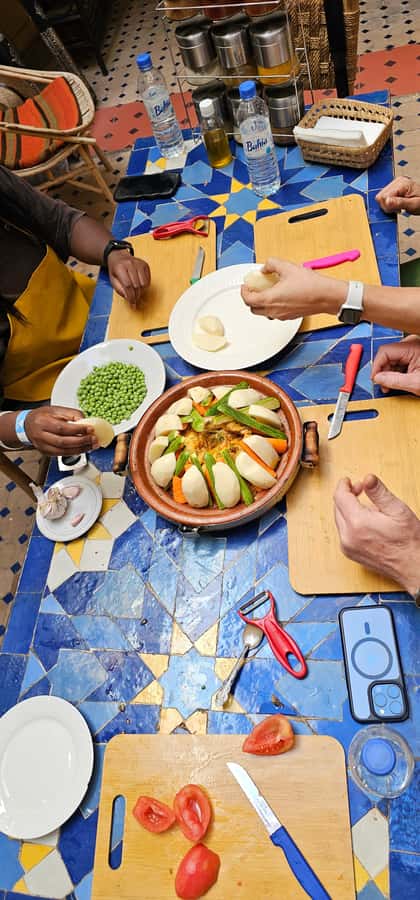 Marrakech: Moroccan Cooking Class with Local Chef - Riad Black Doors: cooking in a real home setting