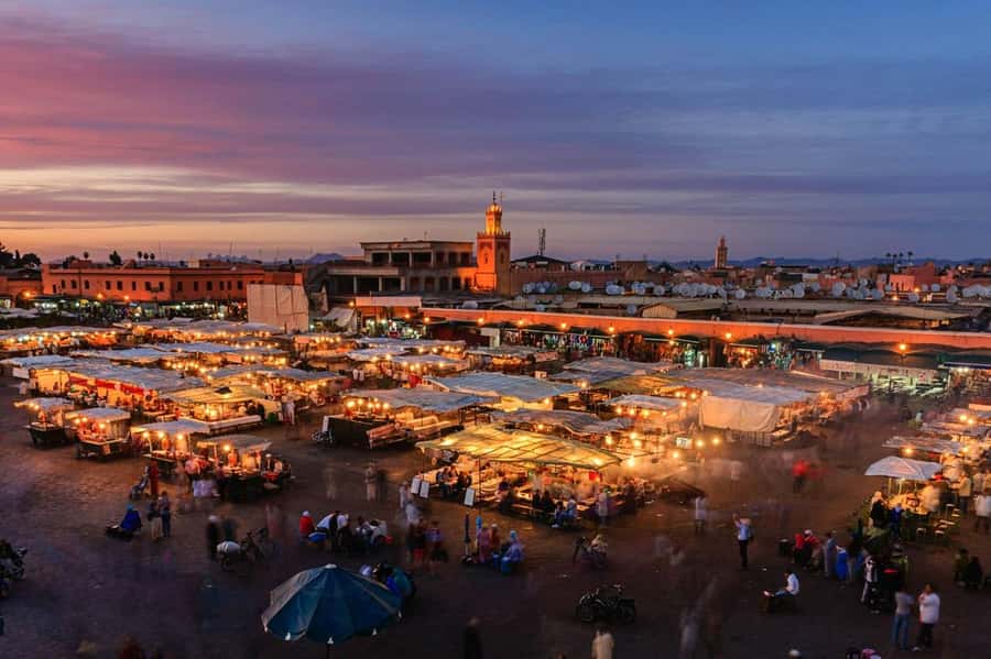 Marrakech: Souk by Night Medina Guided Walking Tour. - Jemaa el Fnaa at night: the sensory center of Marrakech