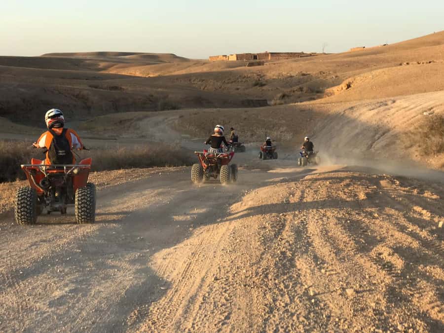 Marrakesh: Agafay Desert Quad & Camel Tour with Dinner - Camel ride through Agafay’s rocky desert, with nomadic dress