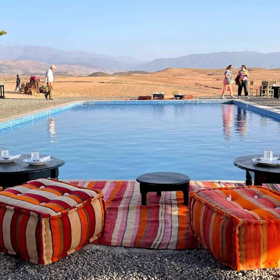 Marrakesh: Agafay Desert Tour with Lunch and Swimming Pool - Agafay Desert with a Berber camp pool, not a cram-your-day ride