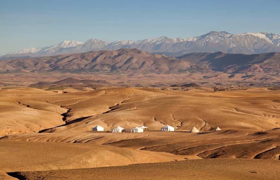 Marrakesh: Desert & Mountain Tour with Camel Ride & Lunch - Agafay Desert camp and camel ride: rocky, dramatic, and very photogenic